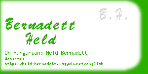 bernadett held business card